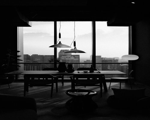A clean and calm interior apartment setting illustrating great contrast balance for nighttime relaxation without intense screens
